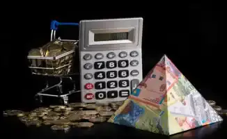 Каждый казахстанец теряет 92 тенге в день: банки на этом зарабатывают